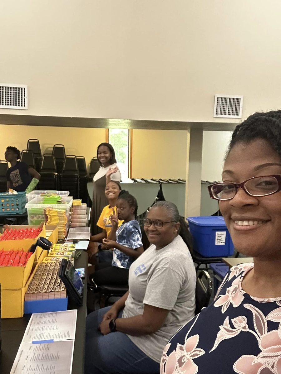 Volunteers packing supplies at Faith Temple Complex